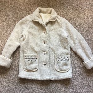 Women’s Large off-white coat.